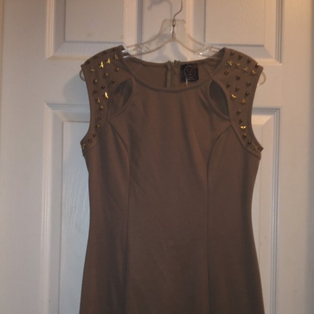 Khaki colored dress.